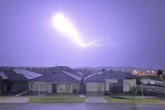 Lightning seen above homes in Wollert on Thursday evening.