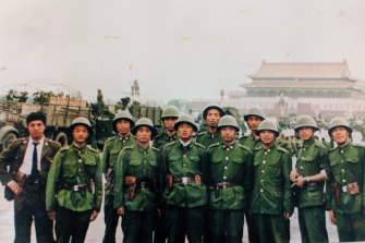 Li Xiaoming, fifth from left, in Tiananmen Square.