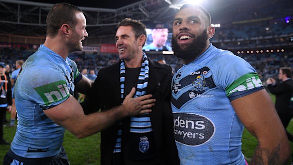 NSW coach Brad Fittler celebrates his triumph with captain Boyd Cordner (left) and Josh Addo-Carr.