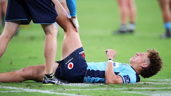 In doubt: Mark Nawaqanitawase receives treatment at Bankwest Stadium last week. 