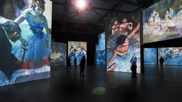 The exhibition combines projected images of artworks along with other sensory triggers.