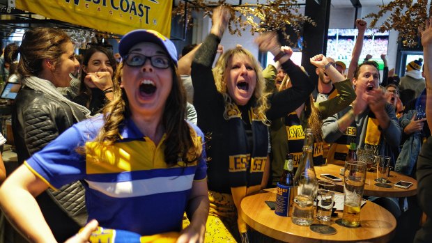 Ecstatic West Coast supporters at the Coppersmith Hotel in South Melbourne.