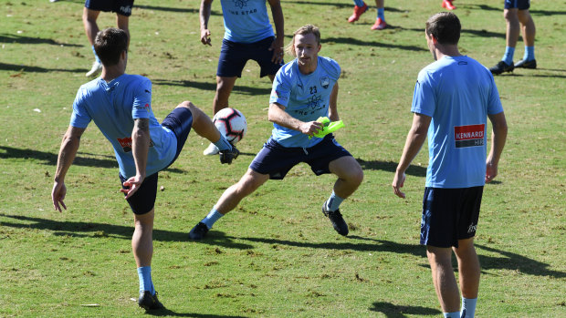 Carefree: Sydney FC were buoyant during Tuesday's training session ahead of the grand final.