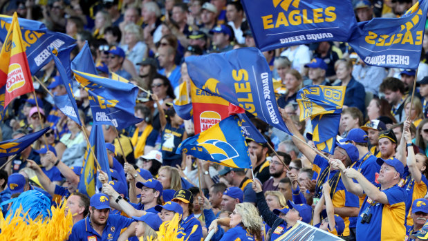 Eagles lair: West Coast fans fly the flags at Optus Stadium in Perth.