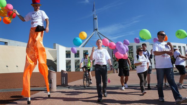 Economist Professor Steve Keen setting off on his 200km walk from Canberra to Mount Kosciuszko after losing a bet with the Macquarie Group over Australian house prices in 2010. 