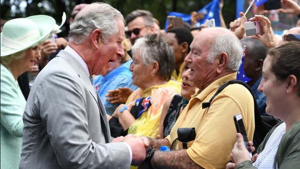 Prince Charles smiled, chatted and shook hands with many well-wishers during a public walk in Brisbane on Wednesday.