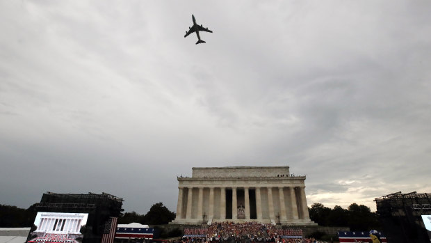 Special Air Mission 28000, Air Force One when the President is aboard, flies over Washington during an Independence Day celebration attended by President Donald Trump at the Lincoln Memorial.