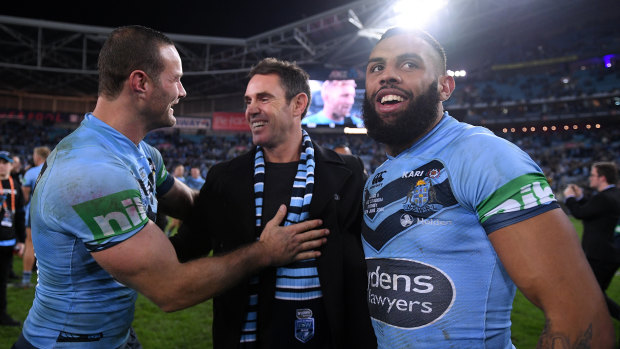 Winners are grinners: NSW coach Brad Fittler celebrates victory in Origin II in 2018 and the series with captain Boyd Cordner (left) and Josh Addo-Carr.