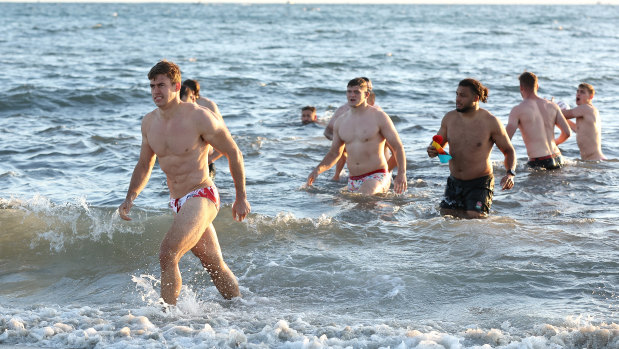 Guy Porter (left) walks from the ocean in Perth after an England recovery session before the first Test.
