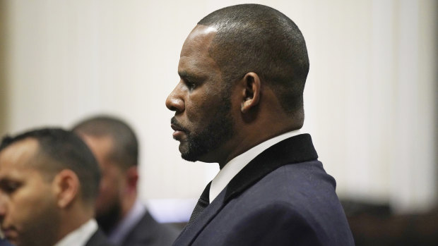 R. Kelly stands during a hearing in his sex abuse case at Leighton Criminal Court Building in 2019.