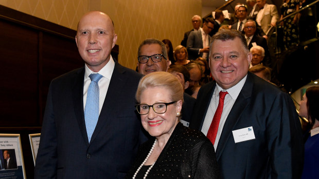 Home Affairs Minister Peter Dutton, former speaker Bronwyn Bishop and Liberal MP Craig Kelly arrive at the dinner.
