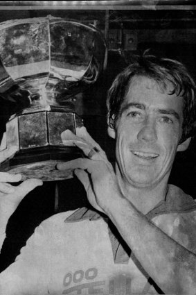 Hunt holds up the British Open trophy in 1980.