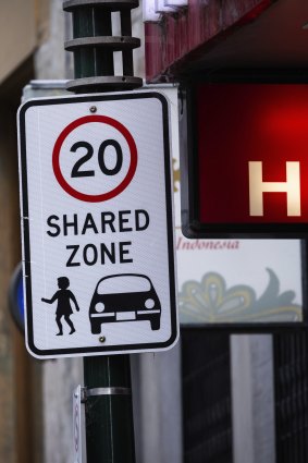 A “shared zone” sign on Little Bourke Street. 