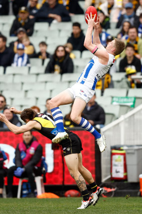 Jack Ziebell takes a hanger in his final game for North Melbourne.