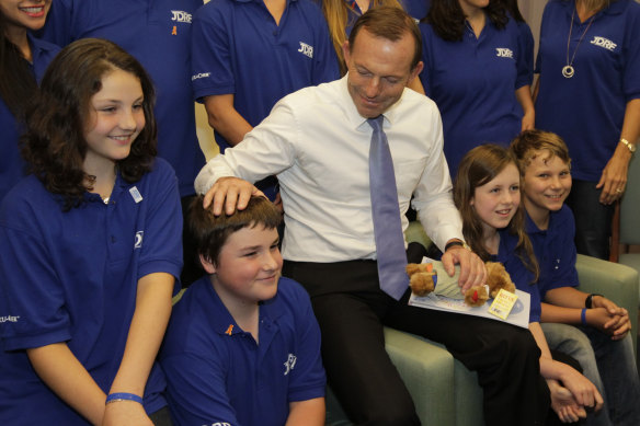 Tony Abbott meets children from the Juvenile Diabetes Research Foundation at Parliament House in 2012, when he was opposition leader.