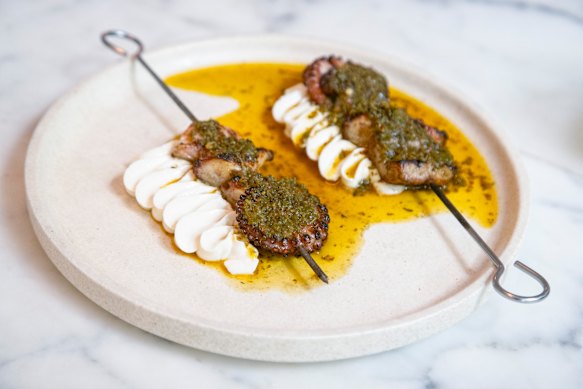 Octopus skewers at Nour. The food is beautifully presented, but a sobering contrast to world events.