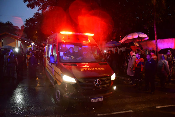 Rescue crews arrive at the crash site in Vinhedo, Brazil.