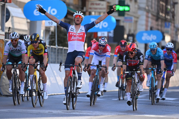 Jasper Stuyven wins Milan-San Remo ahead of Australian Caleb Ewan, right, and Wout van Aert, left. 
