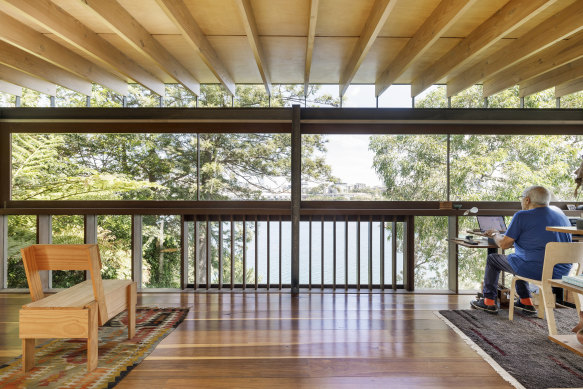 Architect Brian Zulaikha at work in his award-winning Balmain East home.