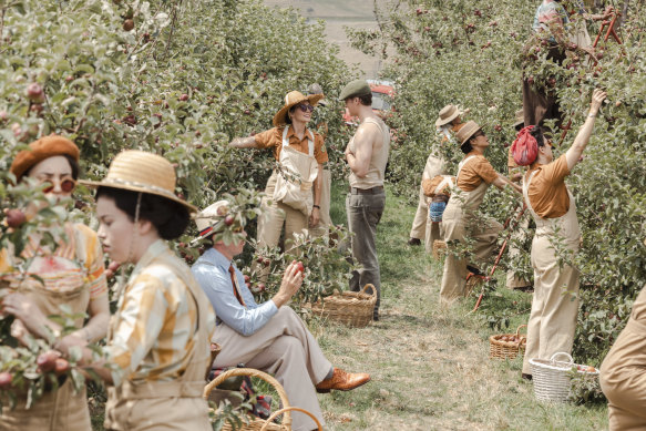 The Women’s Land Army get busy picking apples in While the Men Are Away.
