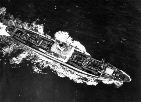 Cold War: A Soviet cargo ship with eight missile transporters and canvas-covered missiles during its return voyage from Cuba to the Soviet Union, 1962.