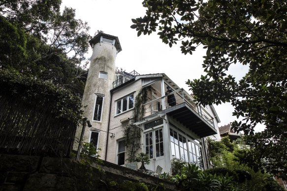 The former home of Brett Whiteley in Lavender Bay. Whiteley’s former wife Wendy is pictured on the balcony.