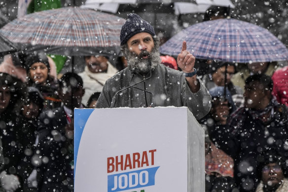 India’s opposition Congress party leader Rahul Gandhi, speaks at a public rally as it snows in Srinagar, Indian controlled Kashmir.