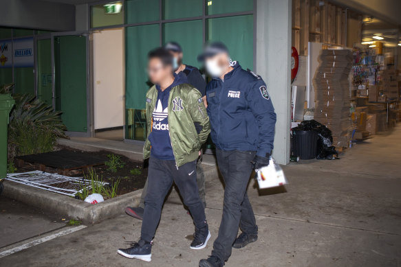 Wuchen Wang was arrested after he attempted to deliver $1 million to a western Sydney diagou store.