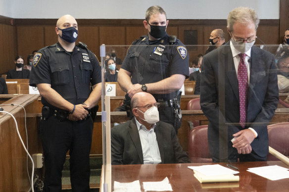 Trump Organisation CFO Allen Weisselberg, seated, appears in court in Manhattan.