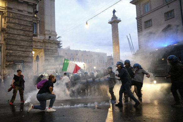 Demonstrators and police clash during the protests in Rome.