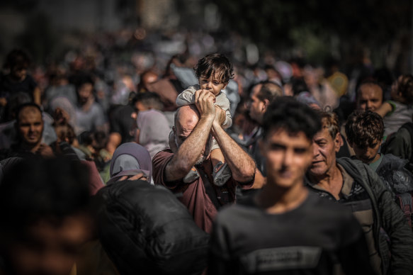 Palestinians leave from the northern part of the Gaza to flee the central and southern parts of the Gaza Strip on Friday. 