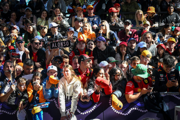 Fans pack Albert Park for a glimpse of the drivers.