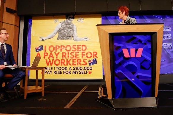 A screen descends behind One Nation leader Pauline Hanson at the National Press Club on Wednesday.