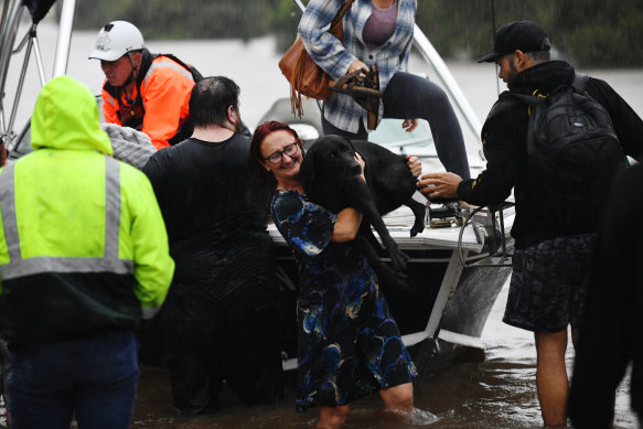 Nobody gets left behind: residents and their pets are taken to Lismore’s evacuation centres. 