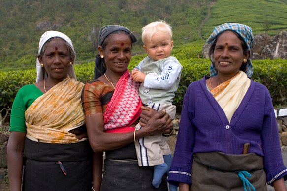 Finn with Tamil tea pickers in the Central Highlands.