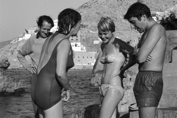 From left: George Johnston and Charmian Clift chat to Marianne Ihlen and Leonard Cohen on a Hydra beach in October 1960. 