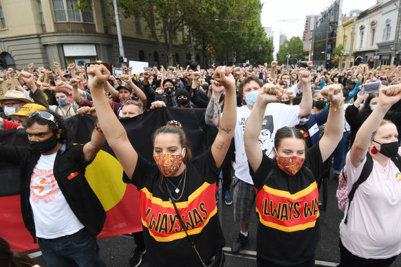 Melbourne protesters rally on January 26 last year for an Invasion Day march.