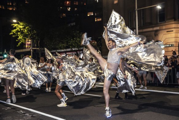 Dancers high-kick down Oxford Street in the 2024 Mardi Gras parade.