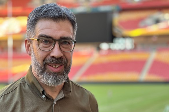 Suncorp Stadium designer David Johnston says the colour of its seats was inspired by Queensland’s shifting sands. 