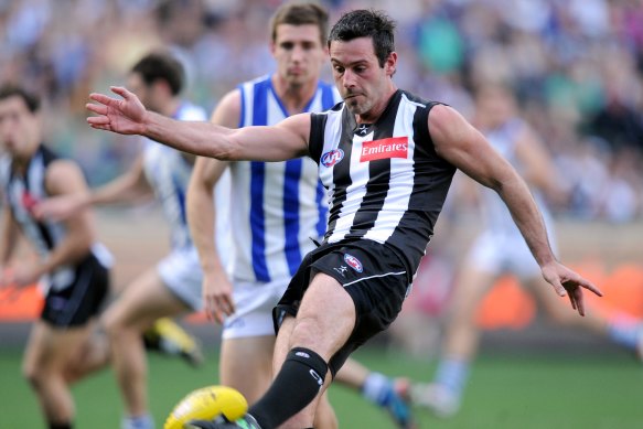 Alan Didak in action at the MCG.