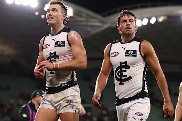 Skipper Patrick Cripps leads his Carlton team off the Adelaide Oval after the Gather Round loss to the Crows.