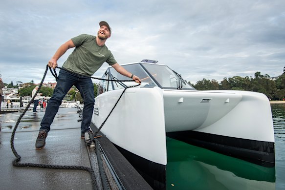 Vessev chief executive Eric Laakmann with the VS-9 electric hydrofoil boat at Rose Bay Marina.