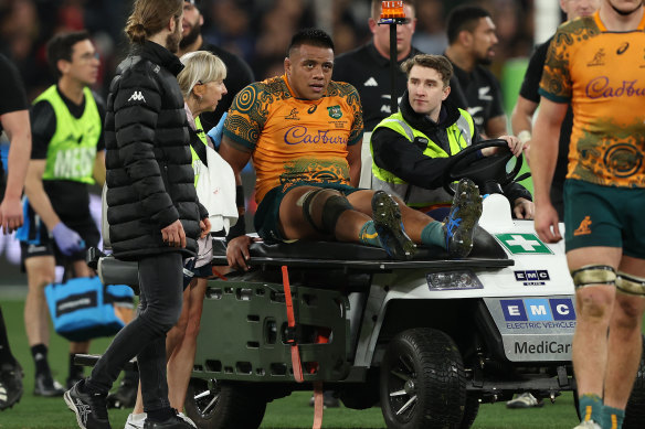 Allan Alaalatoa is carted off the ground at the MCG last Saturday night.