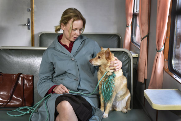 Alma Pöysti with one of Kaurismaki’s trademark scruffy dogs, which always feature in his films.