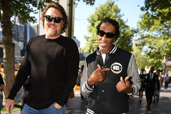 Former Chicago Bulls Luc Longley and Scottie Pippen walk along the Yarra River on Thursday.