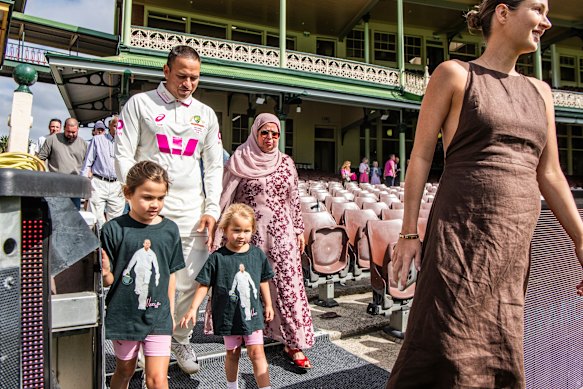 Khawaja and his family after the press conference on Friday.