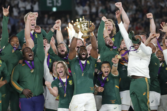 South Africa captain Siya Kolisi lifts the Webb Ellis Cup after defeating England in the 2019 World Cup final in Yokohama.