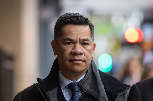Trucking company manager Simiona Tuteru, who has been charged in connection to the Eastern Freeway crash, walks into court in early May.