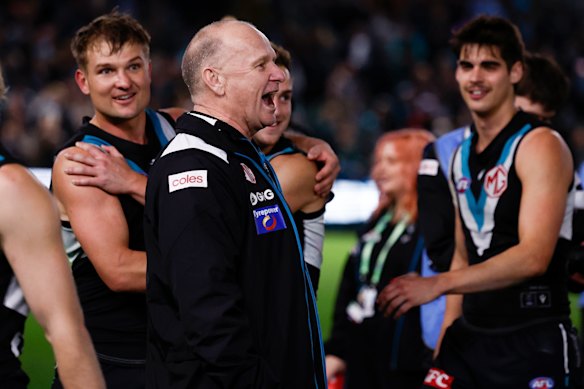 Port coach Ken Hinkley exchanged a few words with Hawthorn players after the final siren of their semi-final last year.
