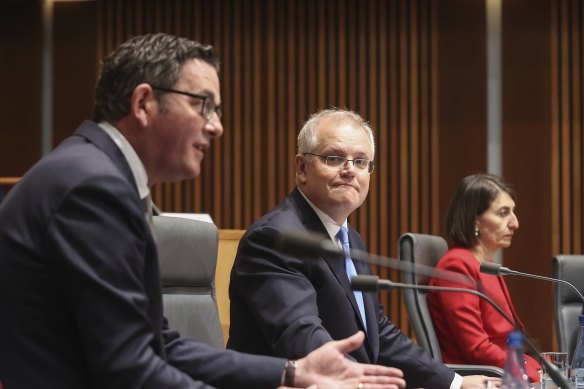 Victorian Premier Daniel Andrews alongside NSW Premier Gladys Berejiklian and Prime Minister Scott Morrison earlier this month.